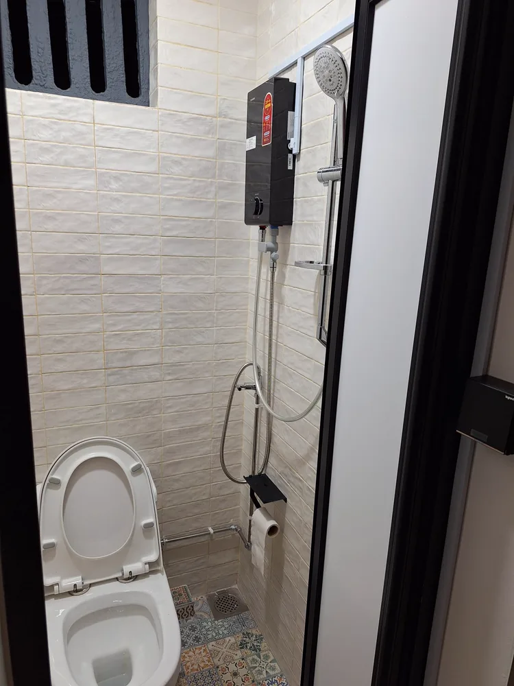 AnyBirdie in-house toilet with shower and heater